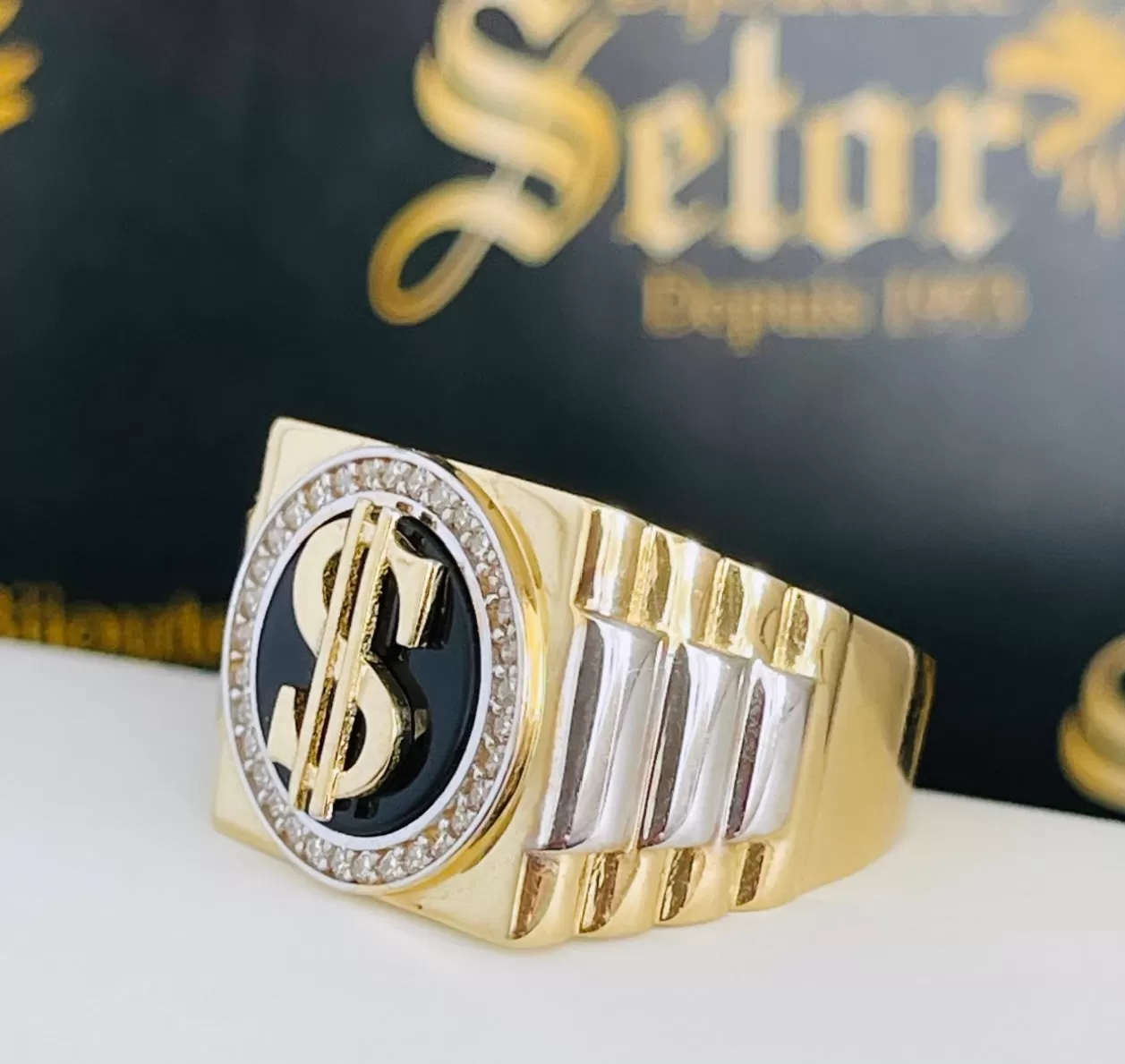 Dollar sign ring