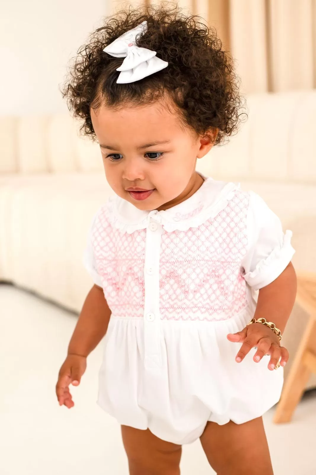 Girls White Smocked Romper Trimmed With Pink